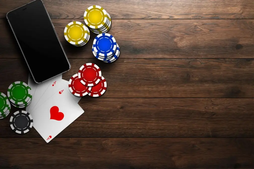 Utilizador a jogar casino online em smartphone através de aplicação móvel